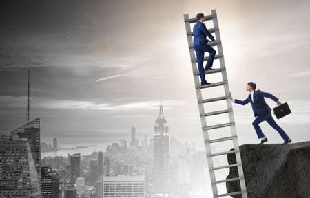 Business unethical competition concept with businessmenの写真素材