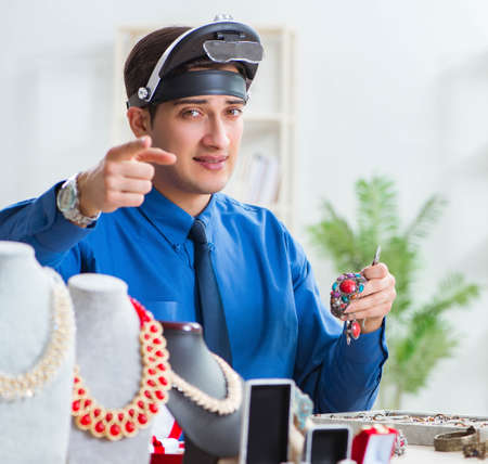 Jeweler working with luxury jewelry in the workshop