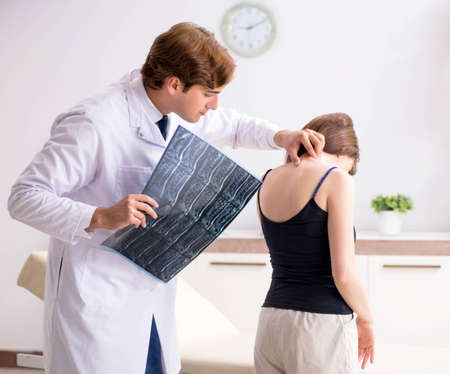 Male radiologist detecting cause of the illnessの写真素材