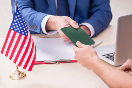 Young man visiting embassy for visa applicationの写真素材