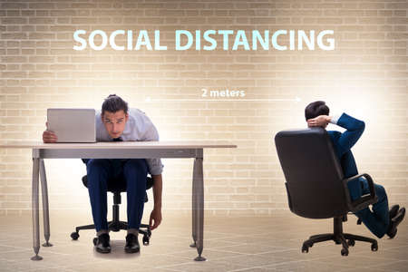 Office social distancing concept during coronavirus pandemicの写真素材