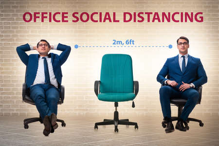 Office social distancing concept during coronavirus pandemicの写真素材