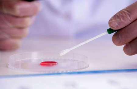 Drug synthesis lab experimentnig with pills