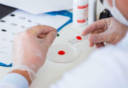 Drug synthesis lab experimentnig with pillsの写真素材