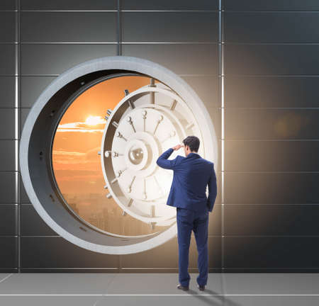 Businessman looking into future with optimismの写真素材