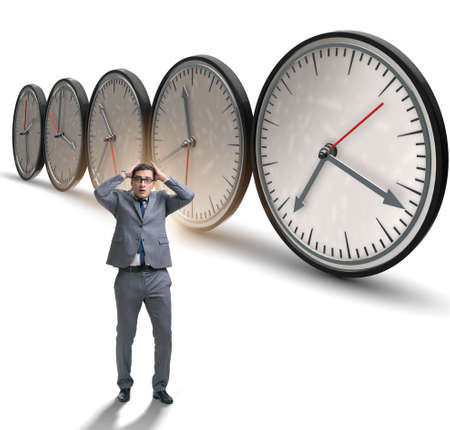 Businessman in time management conceptの写真素材