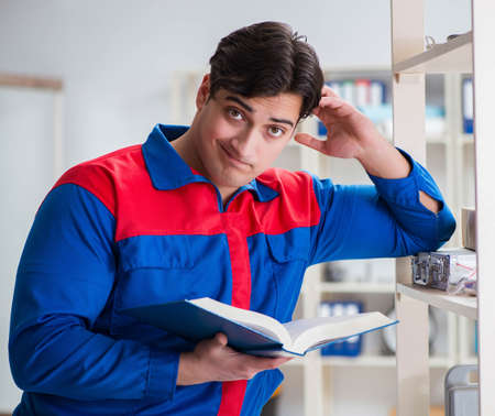 Man working in the postal warehouseの写真素材