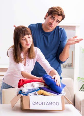 Concept of charity with donated clothingの写真素材