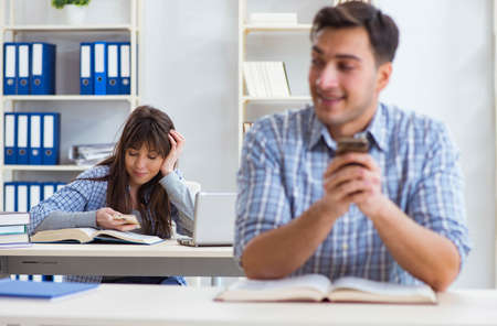 Students sitting and studying in classroom collegeの写真素材