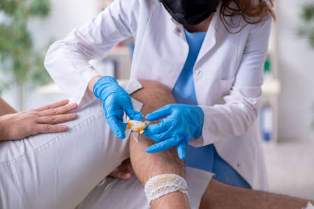 Young leg injured man in the hospital