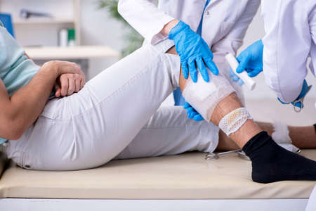 Young leg injured man in the hospital