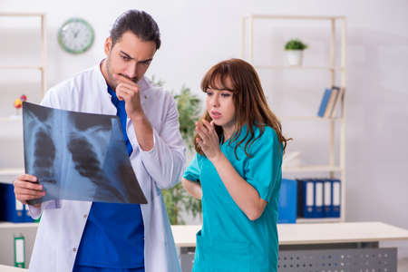 Two doctors colleagues working in the hospitalの写真素材