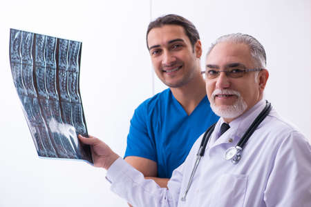 Two male doctors working in the clinic
