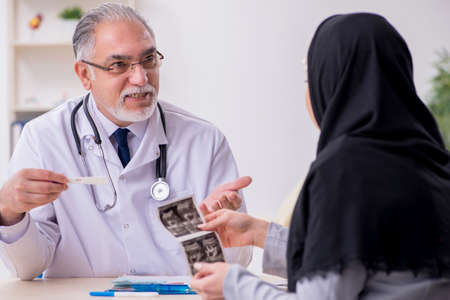 Arab woman visiting experienced doctorの写真素材