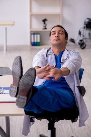 Young doctor working in the hospitalの写真素材