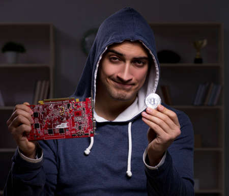 Young man in bitcoin mining concept