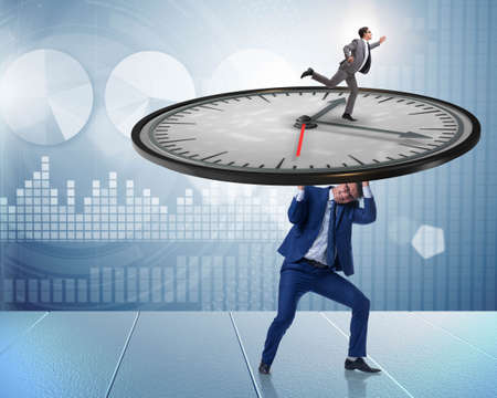 Businessman in time management conceptの写真素材