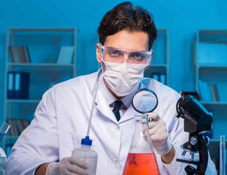 Chemistry assistant working in the chemical lab