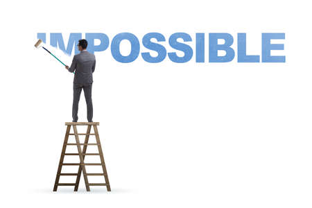 Businessman in impossible business conceptの写真素材