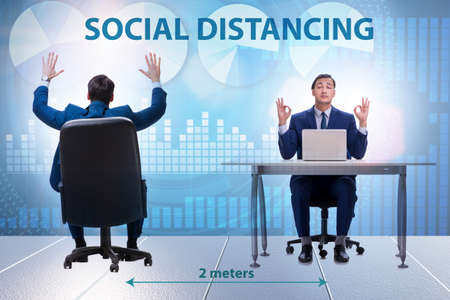 Office social distancing concept during coronavirus pandemicの写真素材