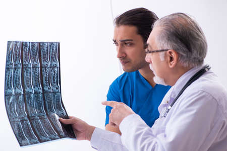 Two male doctors working in the clinic