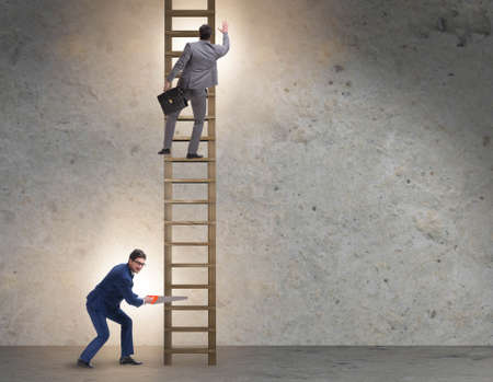 Business unethical competition concept with businessmenの写真素材