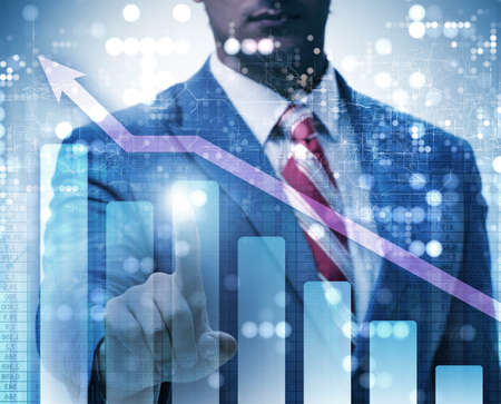 BUsinessman pressing virtual button on diagram chart