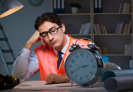 Sleeping architect after late long hoursの写真素材