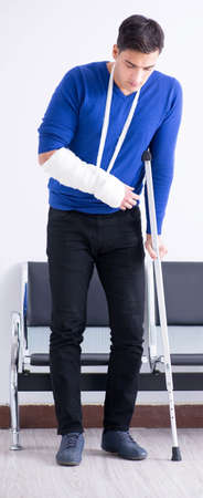 Desperate man waiting for his appointment in hospital with broke