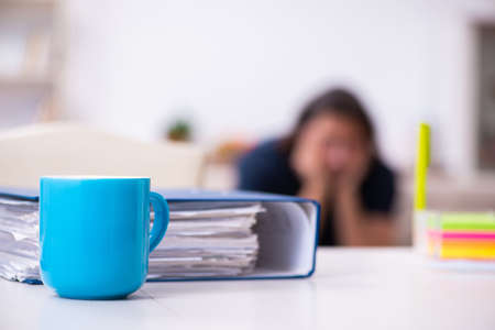 Young man employee working from house