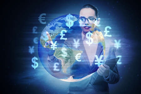Global money transfer and exchange concept with businesswomanの写真素材