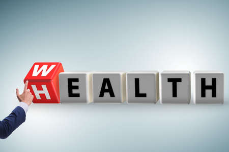 Wealth is health concept with businessmanの写真素材
