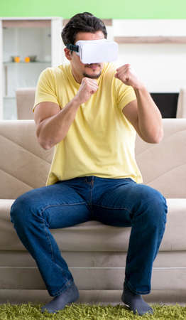 Young man with virtual reality goggles
