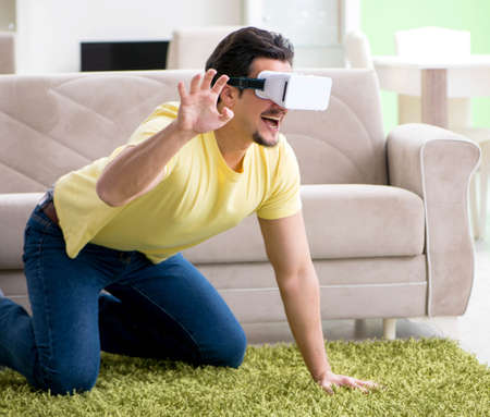 Young man with virtual reality goggles