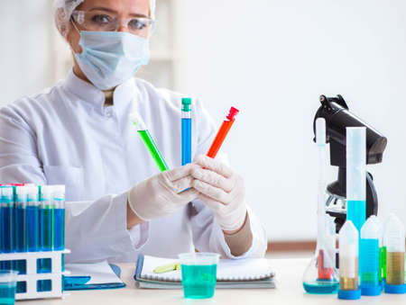 Woman chemist working in hospital clinic labの写真素材