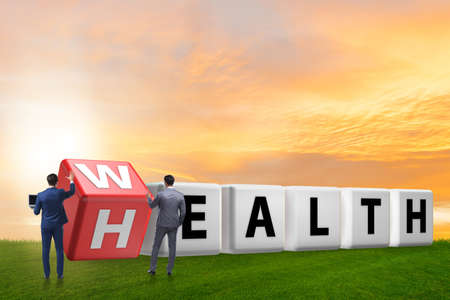 Wealth is health concept with businessmanの写真素材