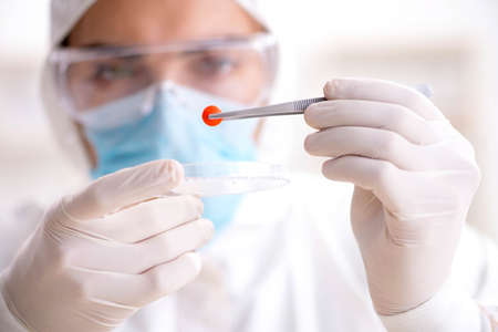 Lab assistant in drug synthesis conceptの写真素材