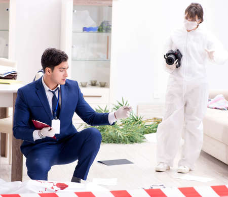 Forensics investigator at the scene of office crimeの写真素材