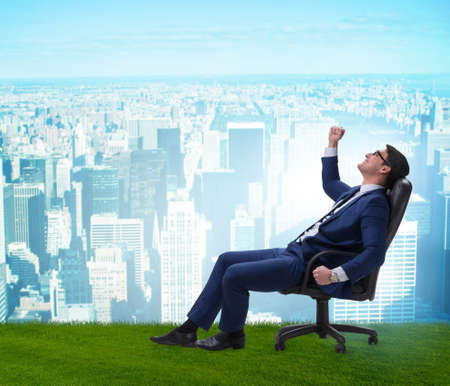Young male businessman enjoying his time during vacationの写真素材