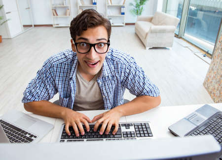 Young trader monitoring markets on screens