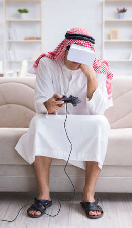 Arab man addicted to video gamesの写真素材