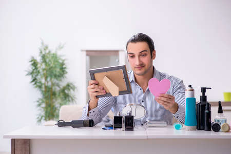 Young handsome man preparing for date