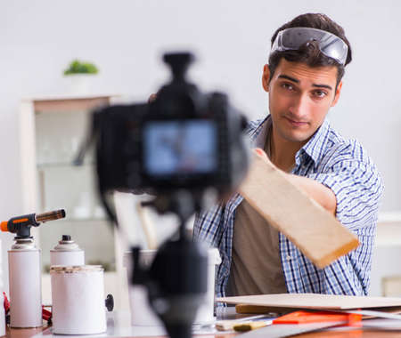 DIY blogger recording video of woorworking hobbyの写真素材