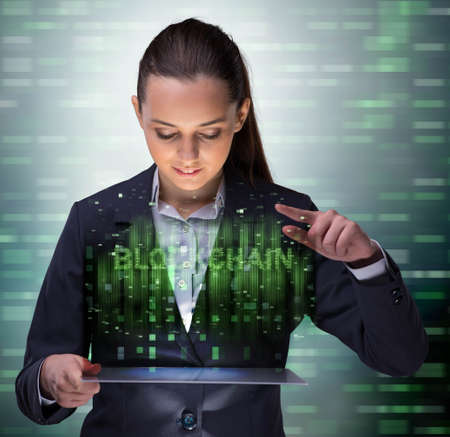 Businesswoman in blockchain cryptocurrency conceptの写真素材