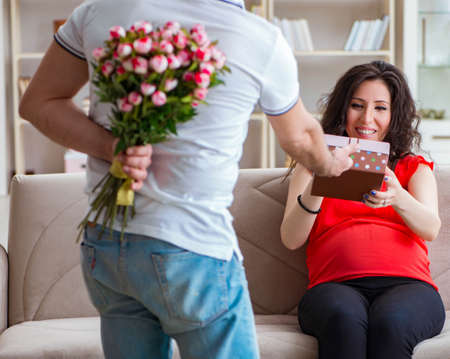 The young couple family expecting a babyの写真素材