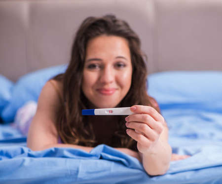 The woman with pregnancy results test