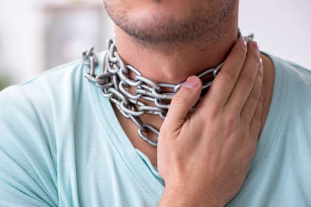 Young man suffering from sore throat