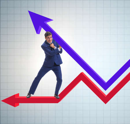 Businessman supporting growtn in economy on chart graph