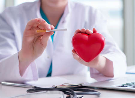 The antismoking concept wih heart in medical conceptの写真素材