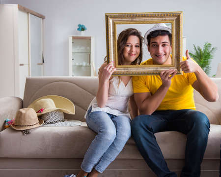 Young family preparing for travel vacationの写真素材